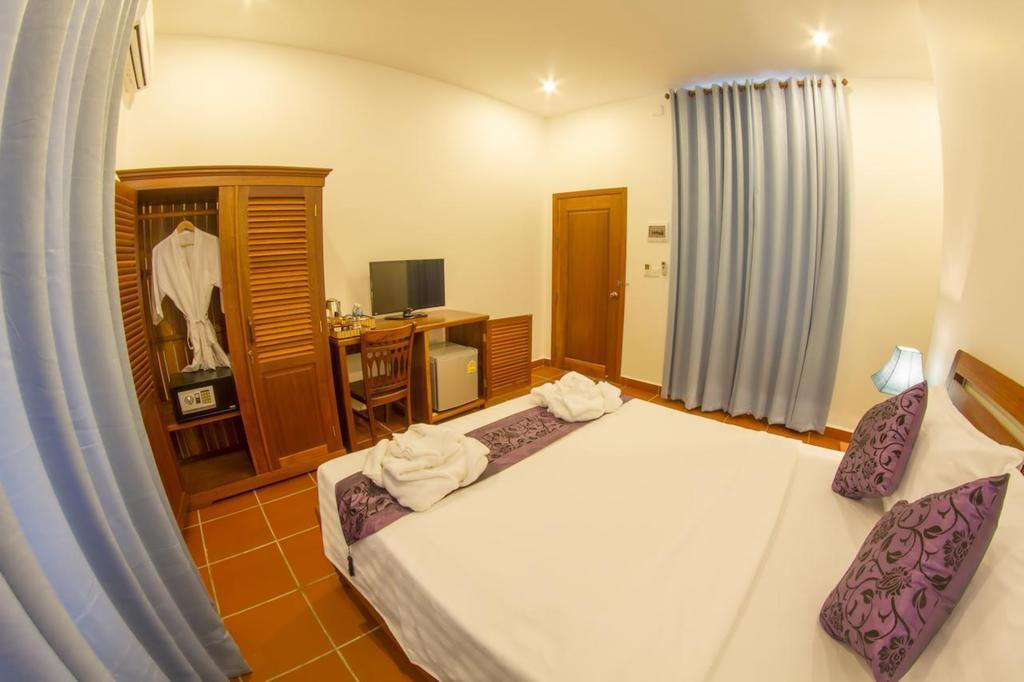 The Blue Corner Boutique Hotel Phnom Penh Quarto foto